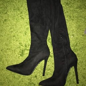 Black pointy over the knee boots